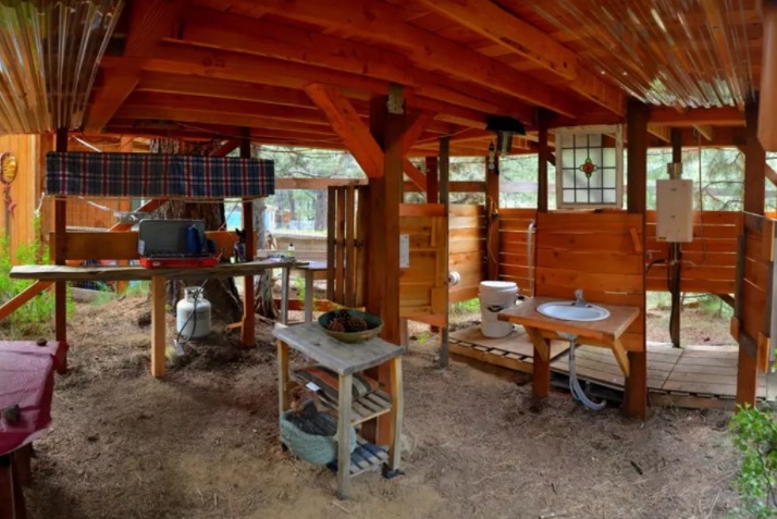 Under the treehouse is the cooking and shower and toilet area.